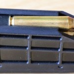 Short action magazines use a block