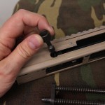 removing charging handle